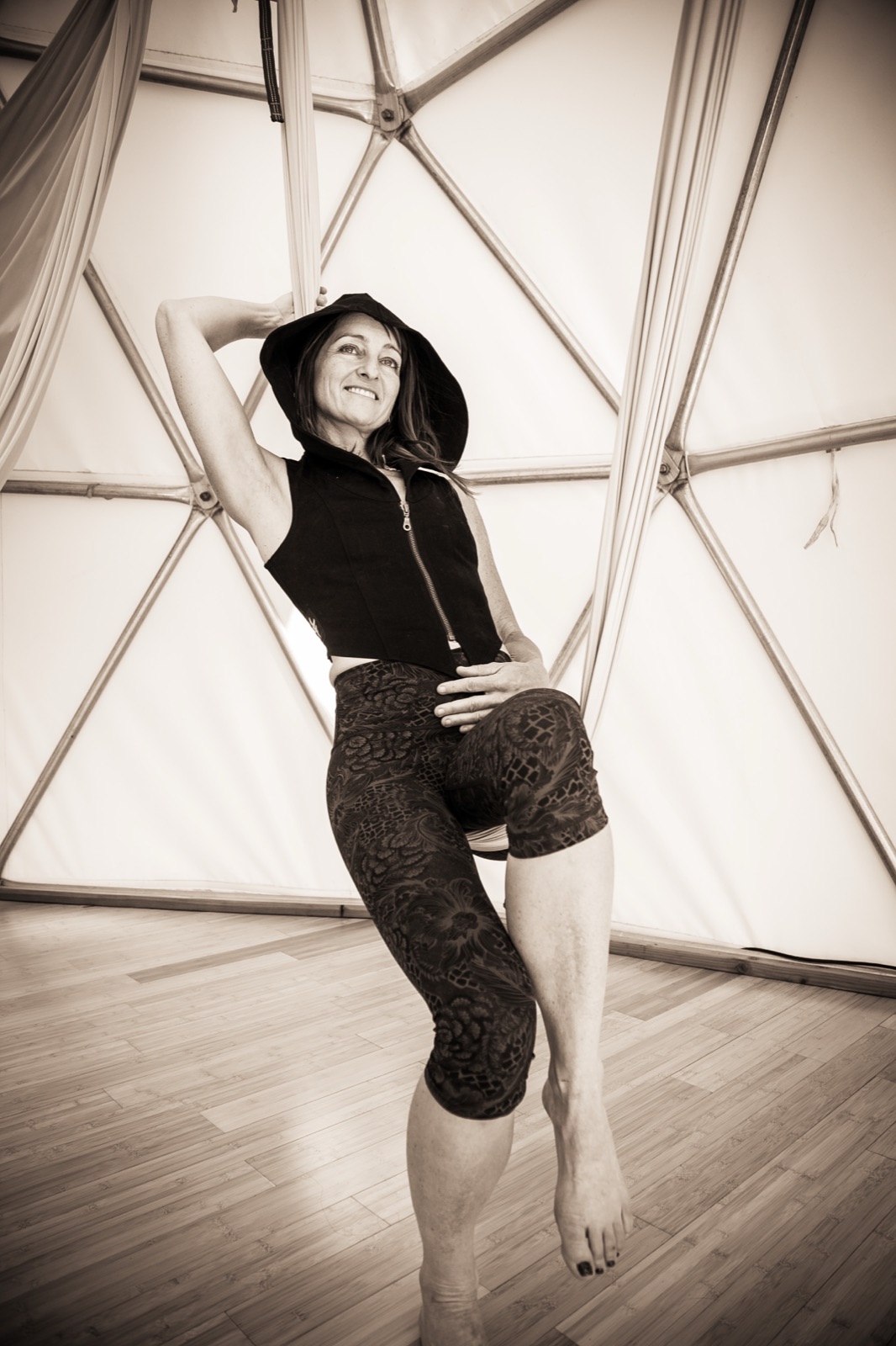 Maura Rassman, founder of Aerial Somatic Therapy, inside the Aum Dome